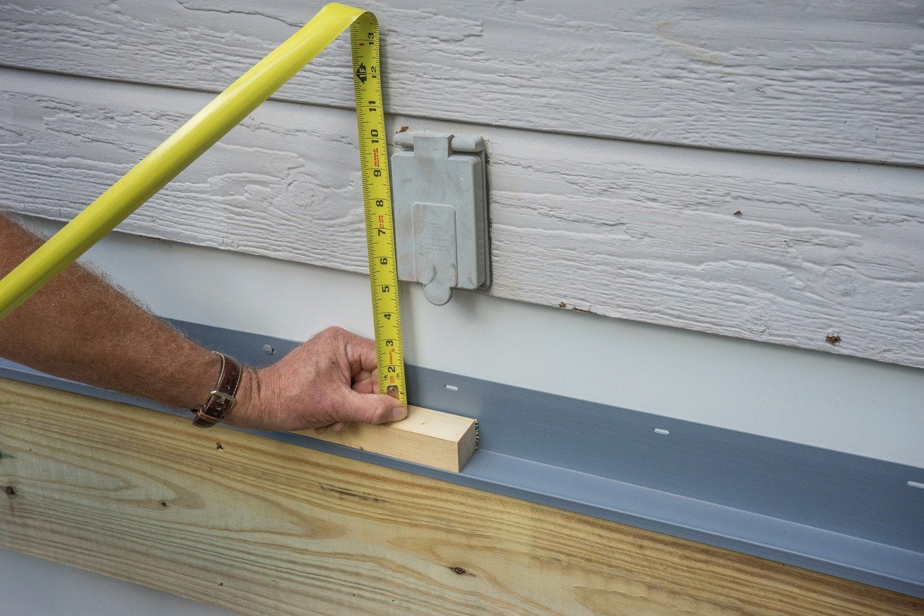 Flashing Where Siding Meets Concrete