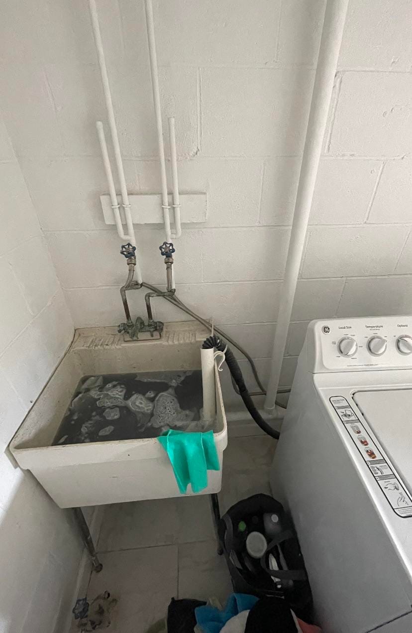 Washing Machine Drains into Sink