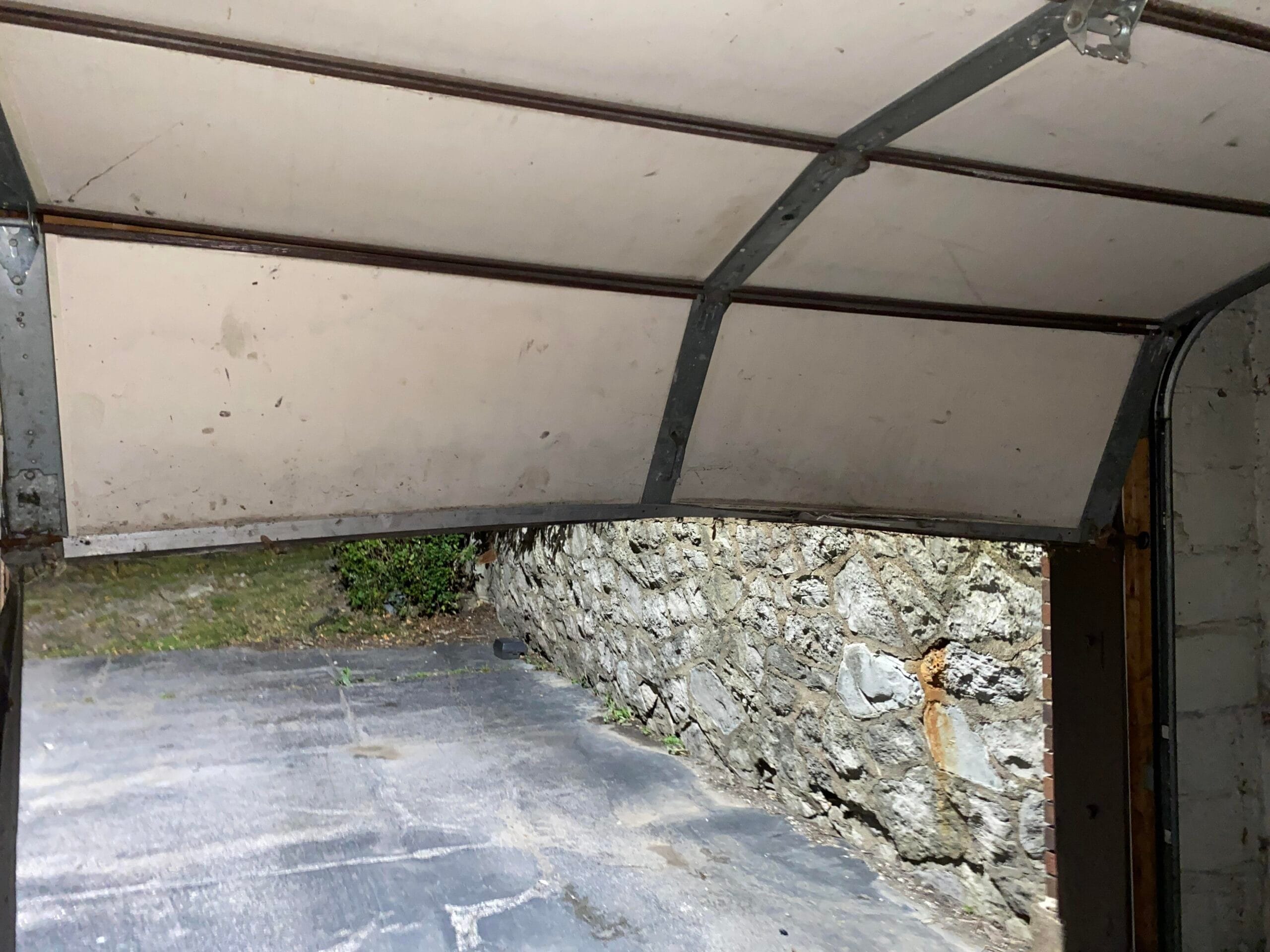 How to Fix Bent Bottom of Garage Door