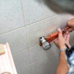 How to Fix a Leaky Shower Without Removing Tiles